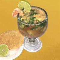 Shrimp Cocktail · Served Hot or Cold, comes with onions, avocado, cilantro, tomato. Crackers or tostada on the...