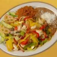 Camarones Al Mojo De Ajo · Served with rice, beans and salad. Choice of flour or corn tortillas.