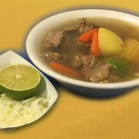 Caldo De Res · Mexican style beef soup, serverd with a side of onions, green chile and limes. Option of cor...