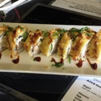 Crispy Tuna · Spicy crab mix and avocado rolled and tempura topped with spicy tuna and drizzled with a spi...
