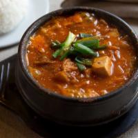 Kimchi Chigae · Hot and spicy kimchi stew with choice of pork or beef.