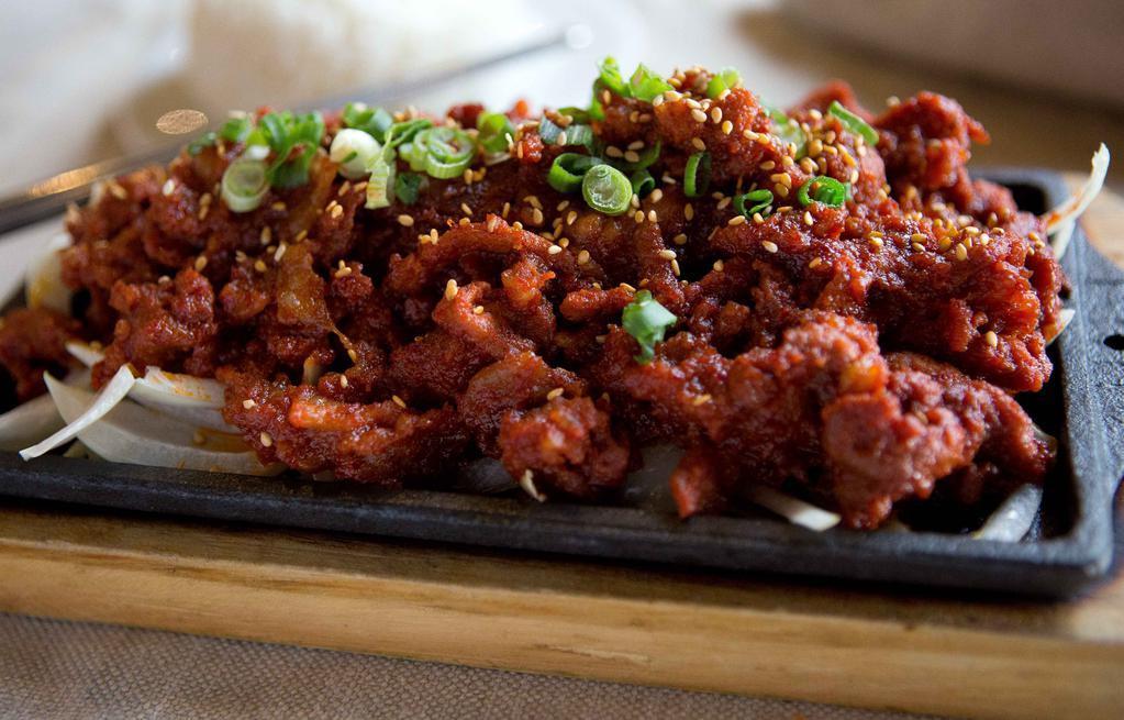 Daeji Bulgogi · Sliced BBQ pork marinated in hot and spicy sauce.