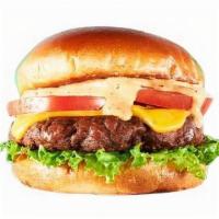 Veg-E-Licious Burger · Meatless burger patty, lettuce, tomato, and veg-e-licious sauce on a toasted bun.