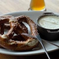 Pretzel Fondue · Original Swiss cheese fondue, served with two Bavarian pretzels.