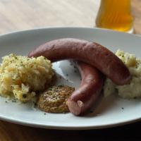 Bier Sausage Dinner · A smoked beef and pork Bavarian bier sausage served with stoneground mustard served with mas...