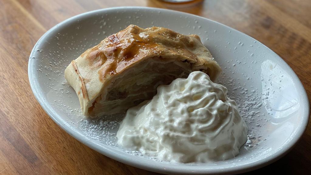 Strudel · Imported directly from Germany, thinly sliced
apples with sweet spices and raisins in a strudel
crust topped with whipped cream.