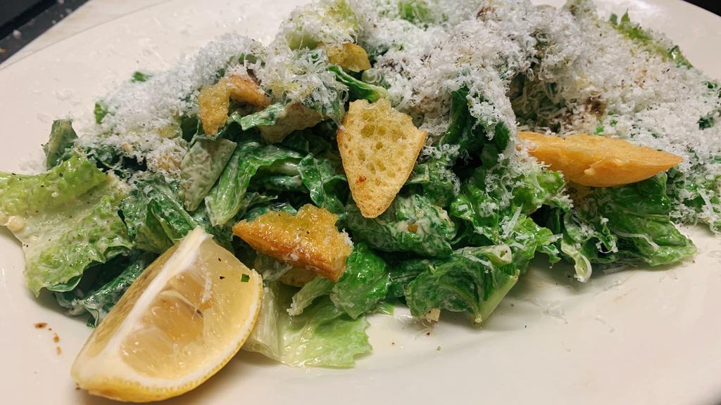 Allora Caesar · Chopped romaine lettuce, house made croutons, shaved parmigiano reggiano, with side of anchovy garlic dressing.