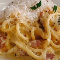 Spaghetti Carbonara · Pancetta, farm fresh egg and cream with parmigiano yum.