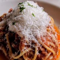 Spaghetti Al Sugo Di Carne · Slow simmered beef and tomato Bolognese with parmigiano.