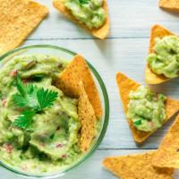 Chips And Guacamole · House made guacamole, served with warm tortilla chips.