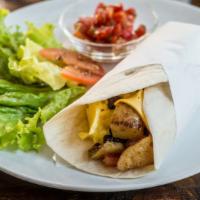 Country Breakfast Burrito · Hearty potatoes, eggs, and cheese wrapped in a large warm flour tortilla.