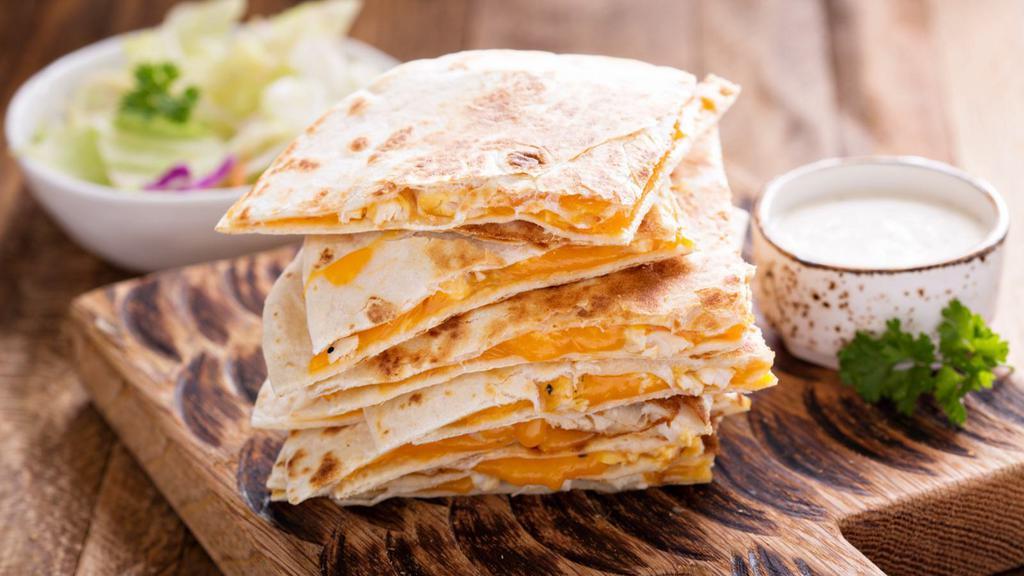 Cheese Quesadilla · Melted cheese folded into a warm flour tortilla, served with a side of guacamole and sour cream.