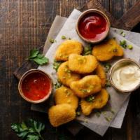 Chicken Nuggets · Crispy golden chicken nuggets, served with a side dish; 5 pcs.