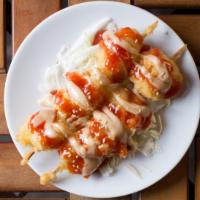 Kfc (Korean Fried Chicken) · Deep fried chicken breast skewer with gochujang sweet chili sauce.