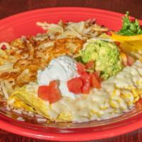Small Vegetarian Omelet · Grilled onions, bell peppers, mushrooms, tomatoes, with avocado, sour cream and mozzarella c...