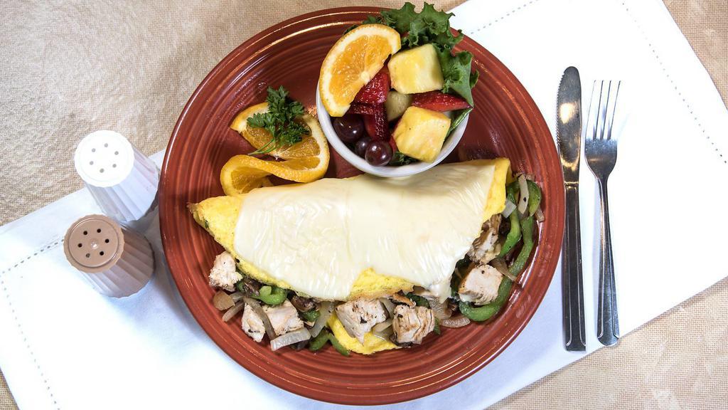 Small Chicken And Veggie Omelet · Grilled sliced chicken breast, onions, bell peppers, mushrooms and provolone cheese. Served with a lighter portion of ingredients, including hash browns or fruit cup, 1 slice of wheat toast or tortilla.