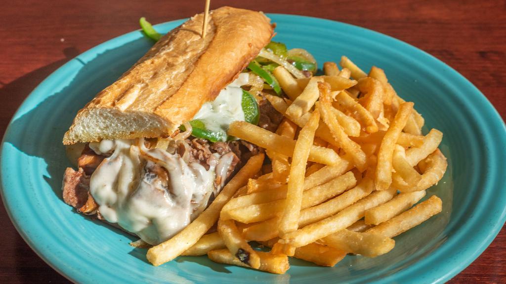 Chicken Philly Sandwich · Grilled thin-sliced chicken, onions, bell peppers, mushrooms and provolone cheese on choice of bread. Includes choice of side.