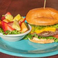 Green Chile Cheese Burger · Includes lettuce leaf and tomato slices. Angus beef patty on a brioche bun. Served with choi...