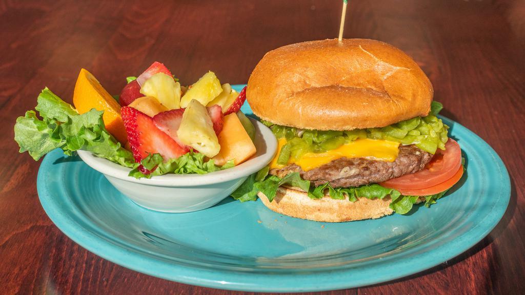 Green Chile Cheese Burger · Includes lettuce leaf and tomato slices. Angus beef patty on a brioche bun. Served with choice of side.