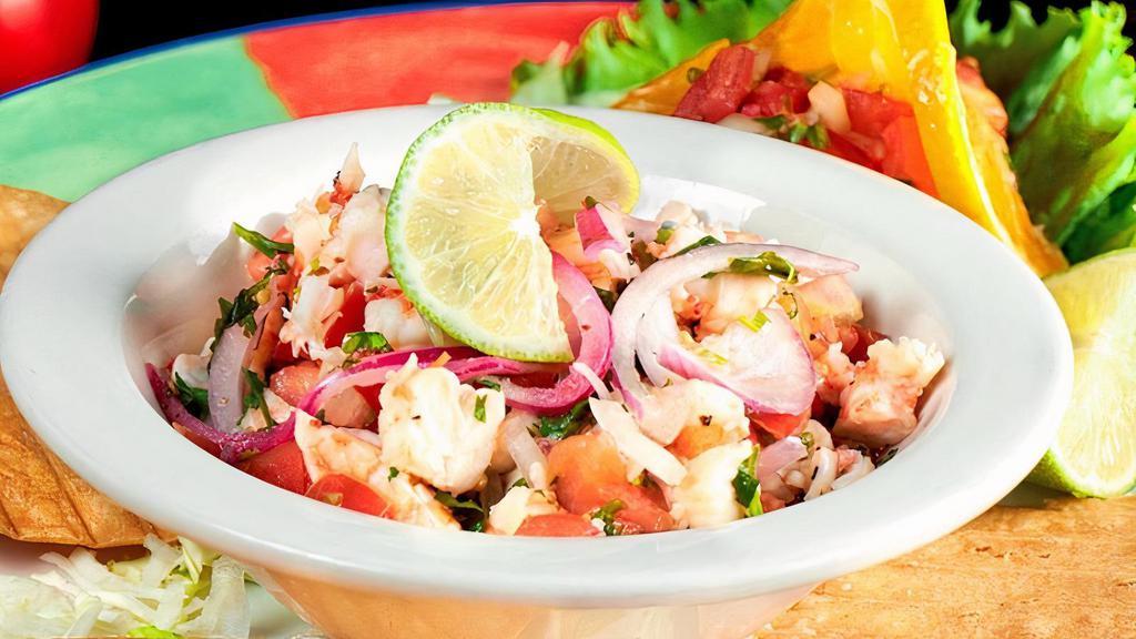 Ceviche · Prawns in lime juice, onions, tomatoes, jalapeños, cilantro