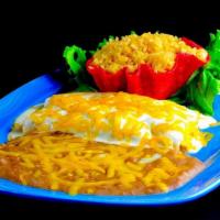 Enchiladas A La Crema · Enchiladas smothered with a rich, decadent cream sauce and cheddar cheese. Tastes best with ...