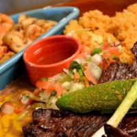 Carne Asada Y Mojo · Your choice of grilled carne asada or grilled pollo asado accompanied by shrimp and mushroom...