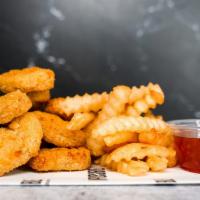 Combo 12 Impossible Chicken Nuggets  · 12 Crispy Impossible chicken nuggets fried to perfection and served with fries along with yo...