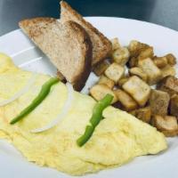 Denver Omelet · bell peppers, onion, and ham. served with home fries and toast
