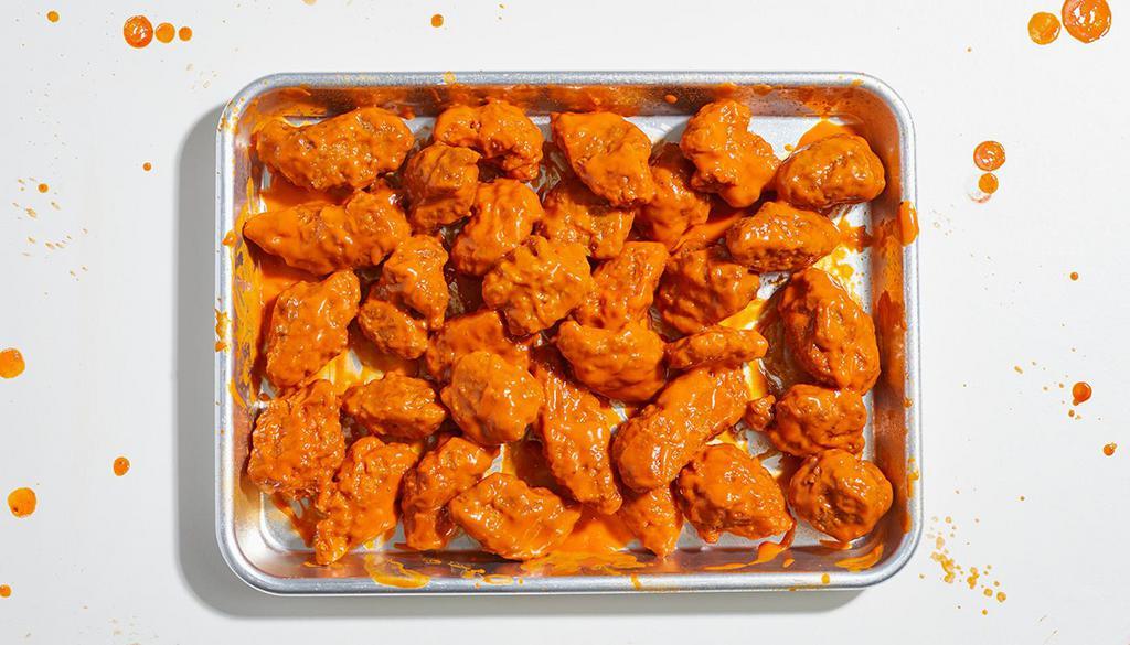 Boneless Chicken Wings (30) · 30 boneless wings with your choice of sauce. Served with celery or carrots, and blue cheese or ranch.