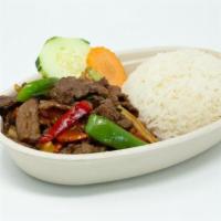 Pepper Steak · Tender beef slices sauteed with sweet onions, carrots, scallions, and bell pepper in a tangy...