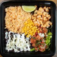 Grilled Shrimp Bowl · Delicious bowls made with Mexican rice, fresh pico de gallo, lettuce, lime, Mexica crema, an...