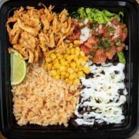 Grilled Chicken Bowl · Delicious bowls made with Mexican rice, fresh pico de gallo, lettuce, lime, Mexica crema, an...