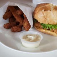 Crispy Chicken Burger · Batter-fried chicken fillet, Swiss cheese, ranch, lettuce, pickles, onion, and tomatoes. Ser...
