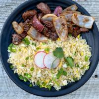 Fried Rice & Shaken Beef · Seasoned fried rice with scrambled eggs, house sauce, white pepper, scallions, served with s...