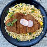 Fried Rice & Pork Chop · Seasoned fried rice with scrambled eggs, house sauce, white pepper, scallions, served with P...
