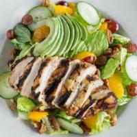 Sweet And Spicy Chicken Salad · Grilled chicken, candied walnuts, mango passion fruit ginger dressing, apples, avocado, pick...