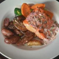 Grilled Sockeye Salmon* · Wild Sockeye with raspberry Chambord-tarragon butter and seasonal vegetables. Choice of garl...