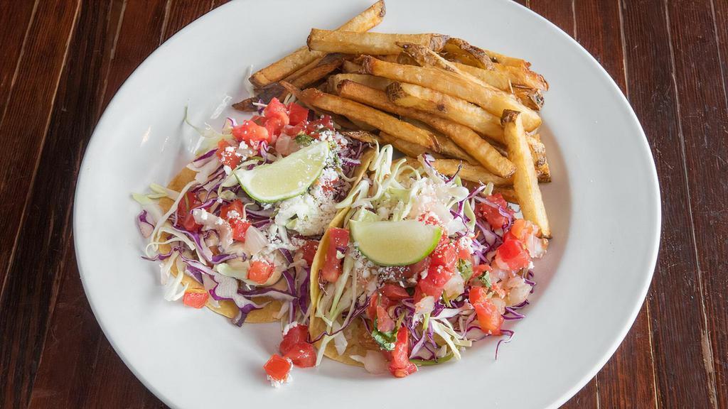 Fish Tacos · Hand breaded Alaskan cod in Mac and Jack's panko crust, chipotle lime aioli, pico de gallo, cabbage and cotija cheese in artisan-corn tortillas. Choice of house cut fries or garlic Parmesan herb fries.