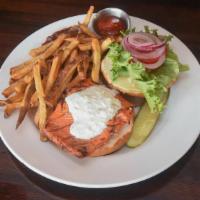 Salmon Burger · Wild Sockeye salmon, tzatziki, tomato, lettuce, onion, and roasted garlic mayo on a pretzel ...
