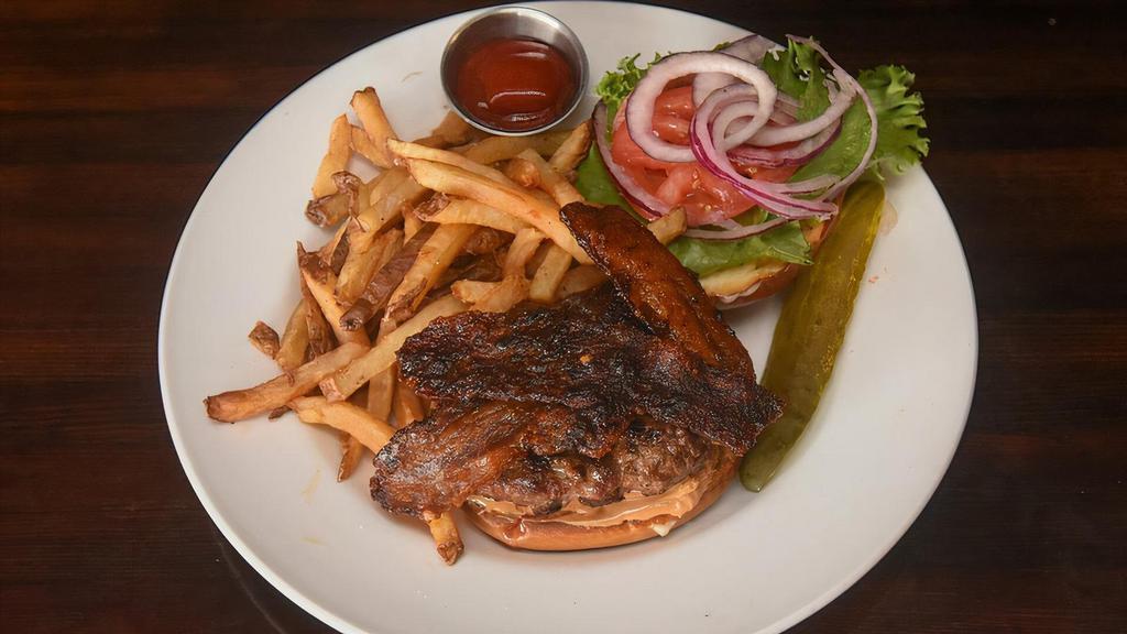 Peanut Butter Bacon · Cajun candied bacon, peanut butter, Redmond's seasoning, tomato, lettuce, onion and roasted garlic mayo on a pretzel bun. Served with your choice of regular or parmesan garlic french fries.