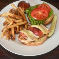 Chicken And Brie · Grilled chicken breast, Brie, apple-onion jam, tomato, lettuce and roasted garlic mayo on a ...