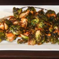 Brussel Sprouts · Crispy Brussel sprouts lightly salted with red pepper vinaigrette, balsamic syrup reduction,...
