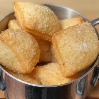 Torta Fritta · pillows of savory dough, fried to a golden brown. Not Vegetarian