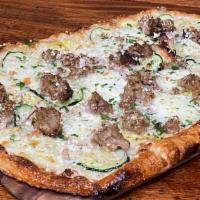 Salsiccia Pizza · Fennel Sausage, Zucchini, Onion, Chili, Roasted Garlic, Mozzarella