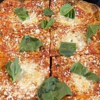 Margherita Pizza · Buffalo Mozzarella, Pecorino, Tomato, Basil,  (vegetarian)