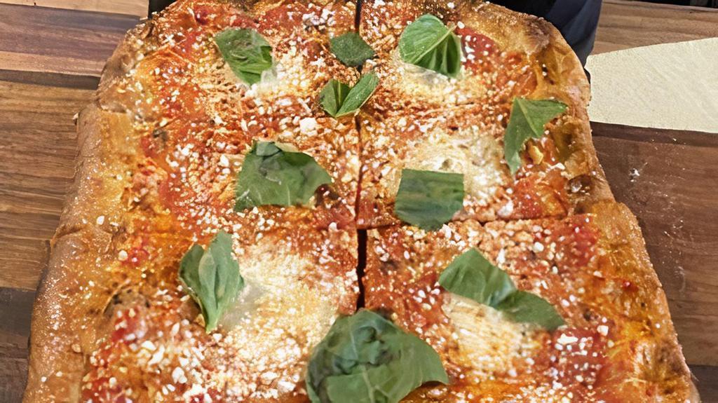 Margherita Pizza · Buffalo Mozzarella, Pecorino, Tomato, Basil,  (vegetarian)