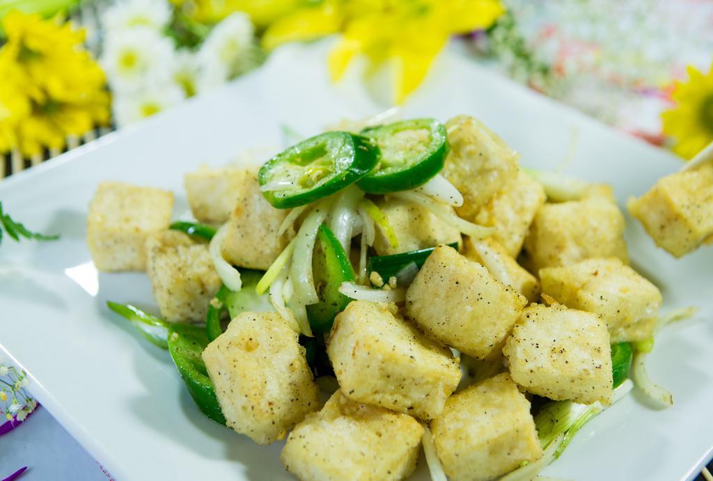 Crispy Salted Pepper Tofu · Spicy. Deep fried tofu stir fried with onions, jalapenos, salt, and a little sauce.