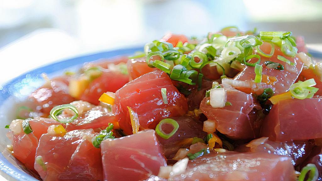 Ahi Poke · Poke Tuna. Contains raw fish.