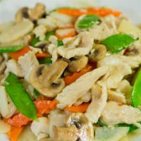 Chicken Moo Goo Gai Pan · Chicken sauteed with snow peas, water chestnuts, bok choy, mushrooms, and carrots in a light...