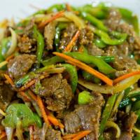 Szechuan Beef · Spicy. Sliced beef stir-fried in onions, bell peppers, celery, and carrots in spicy Szechuan...